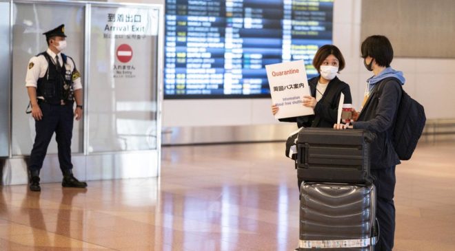 Japan to bar new foreign arrivals over virus variant: PM
