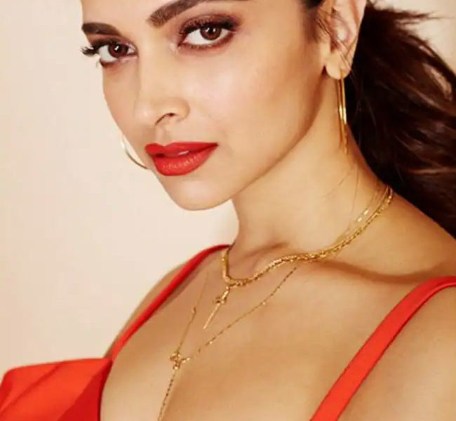 Deepika Padukone with smudged red lipstick